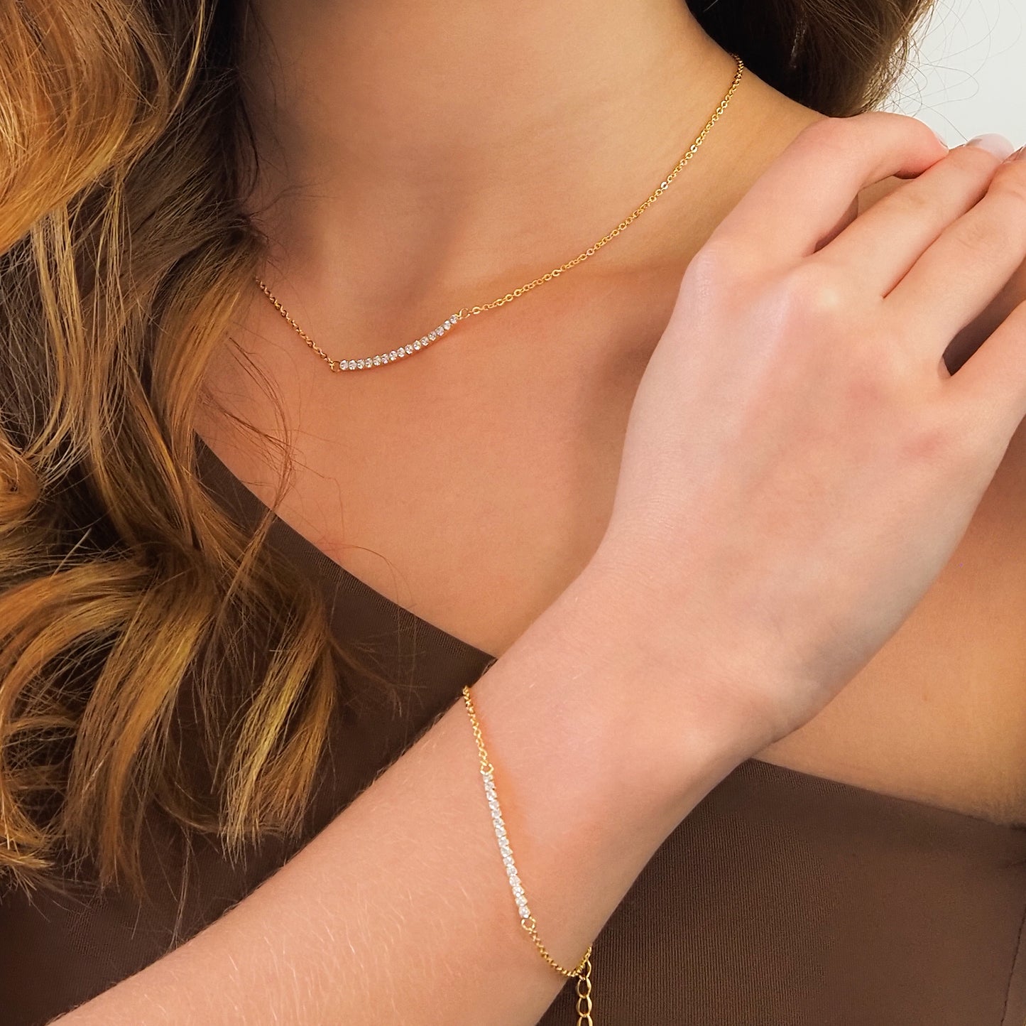 Pulseira arco zirconia dourado