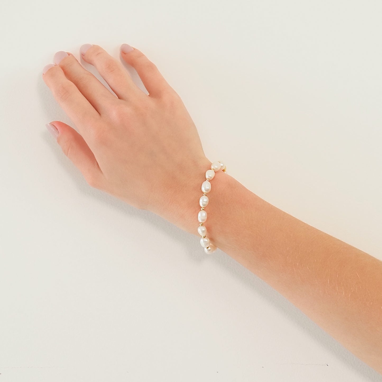 Pulseira pérola dourada