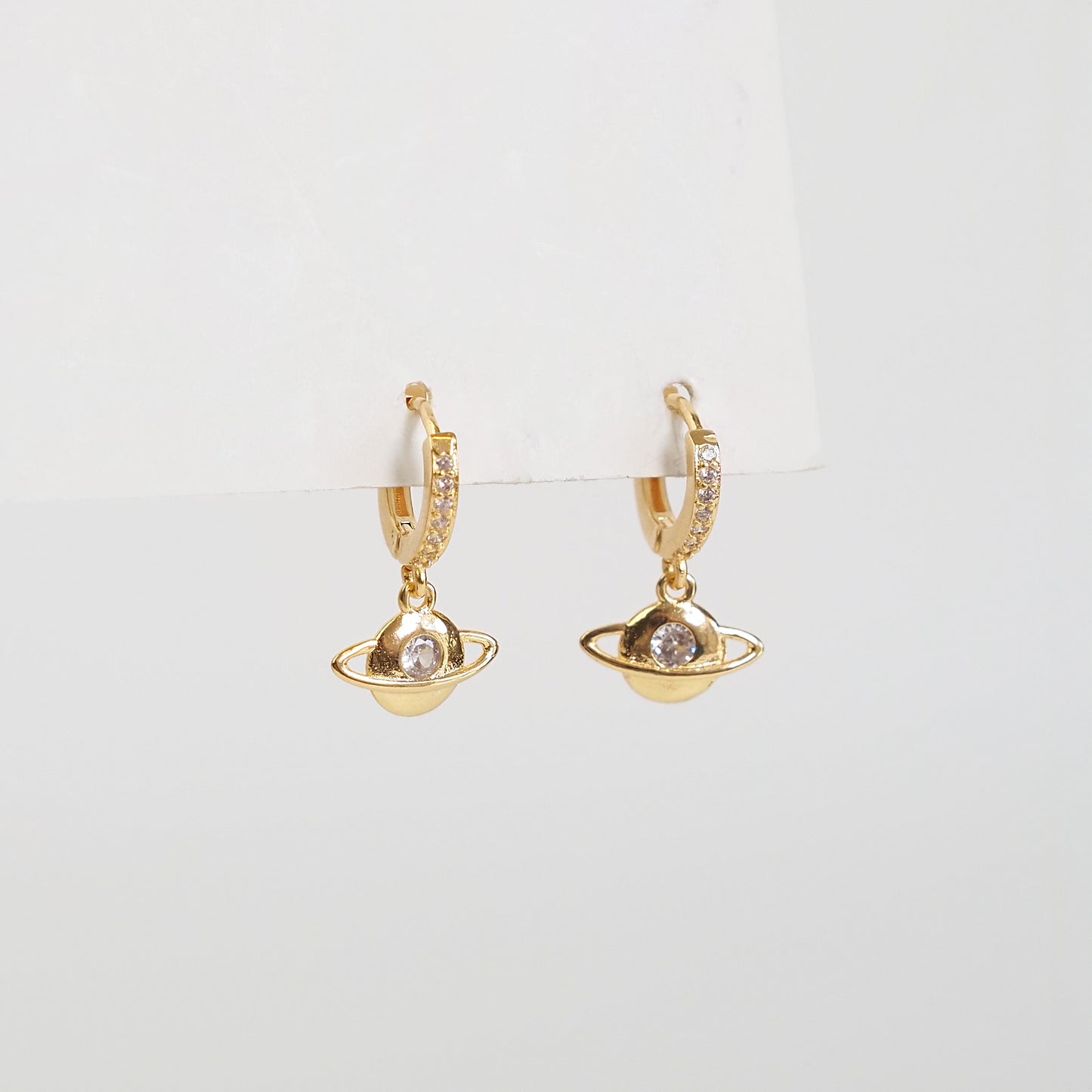 Argola planeta dourado