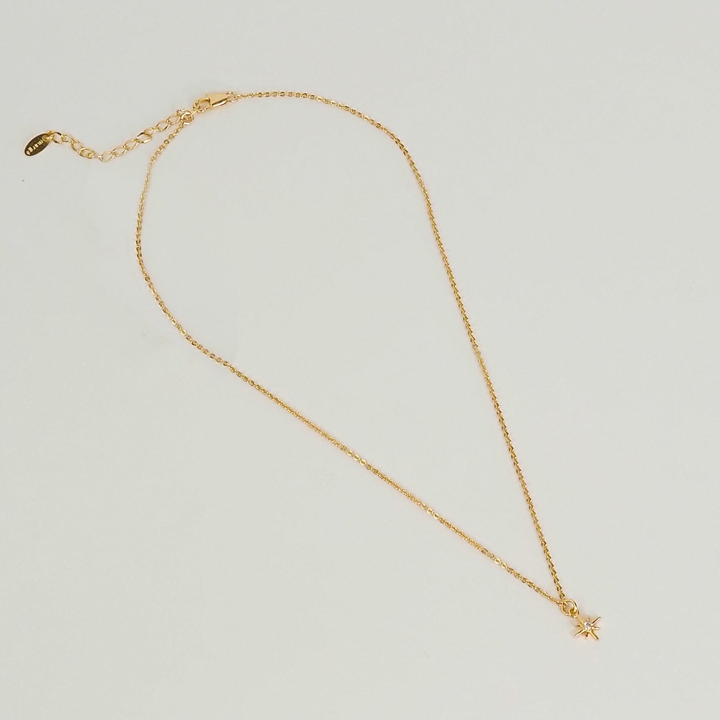 Colar estrela dourado