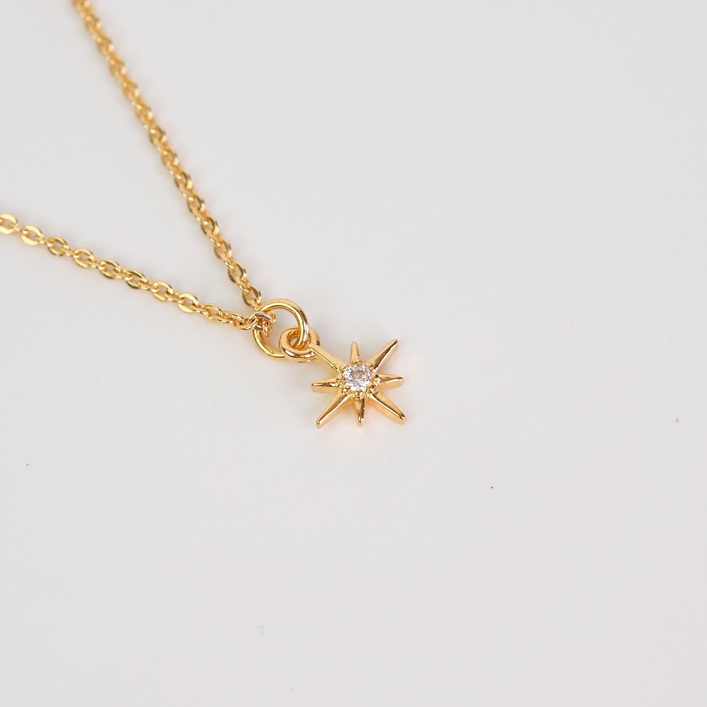 Colar estrela dourado