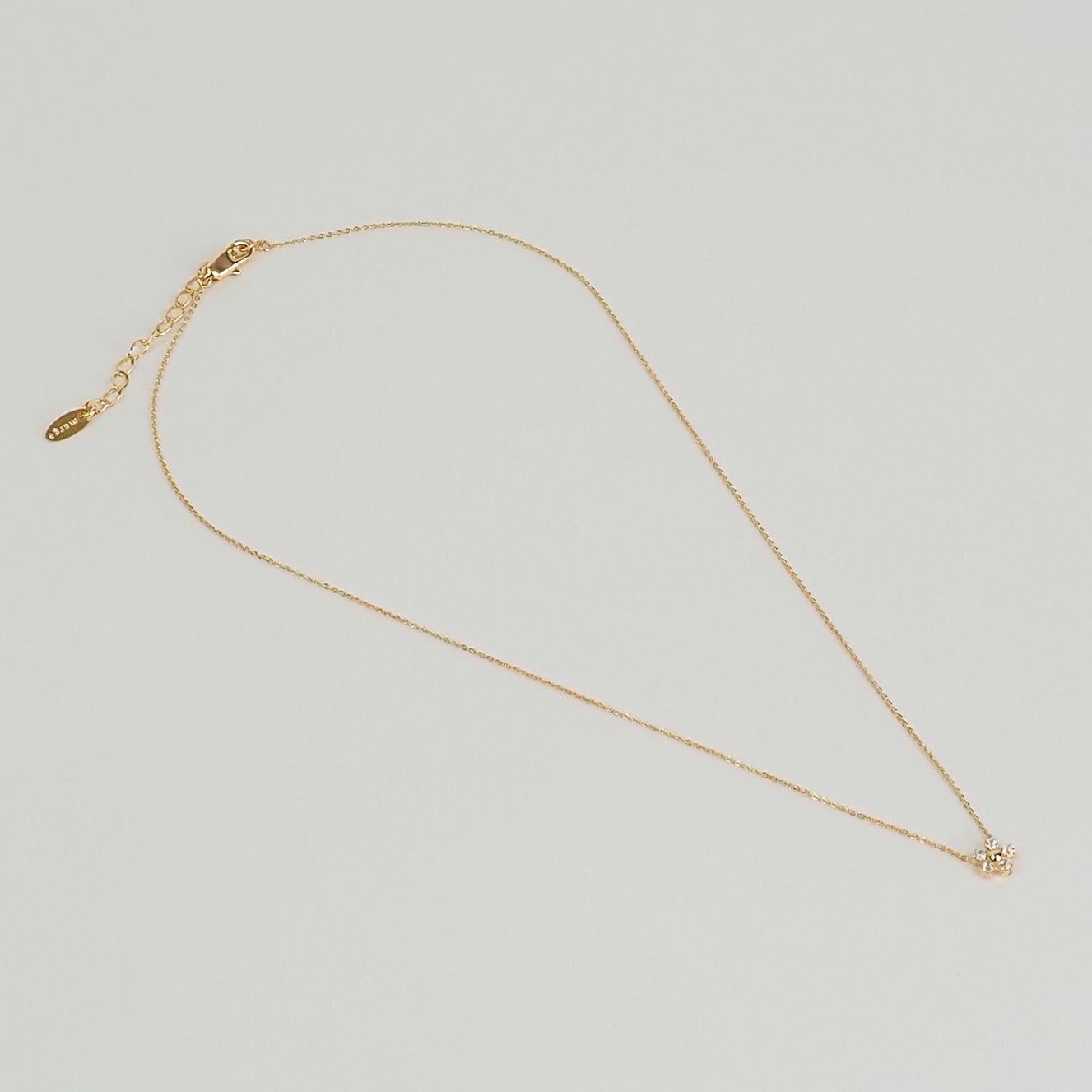 Colar flor zirconia dourado