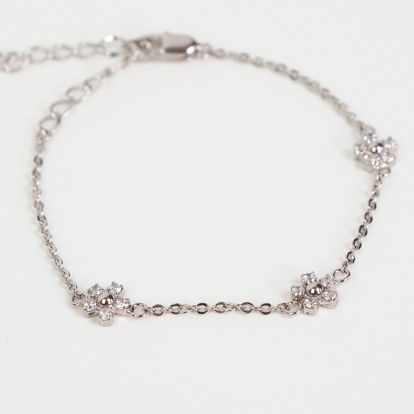 Pulseira flor zirconia prateada