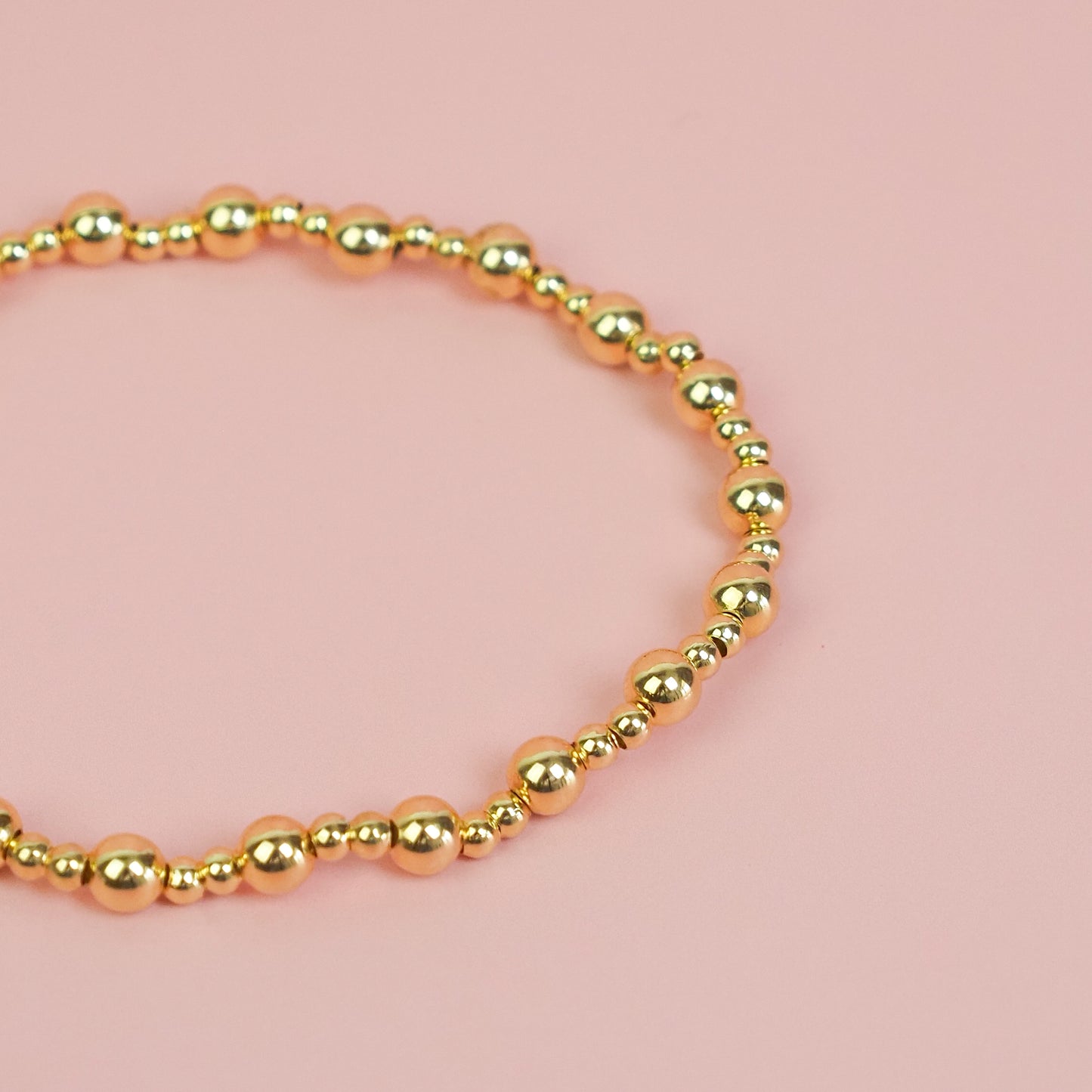 Pulseira confete dourada