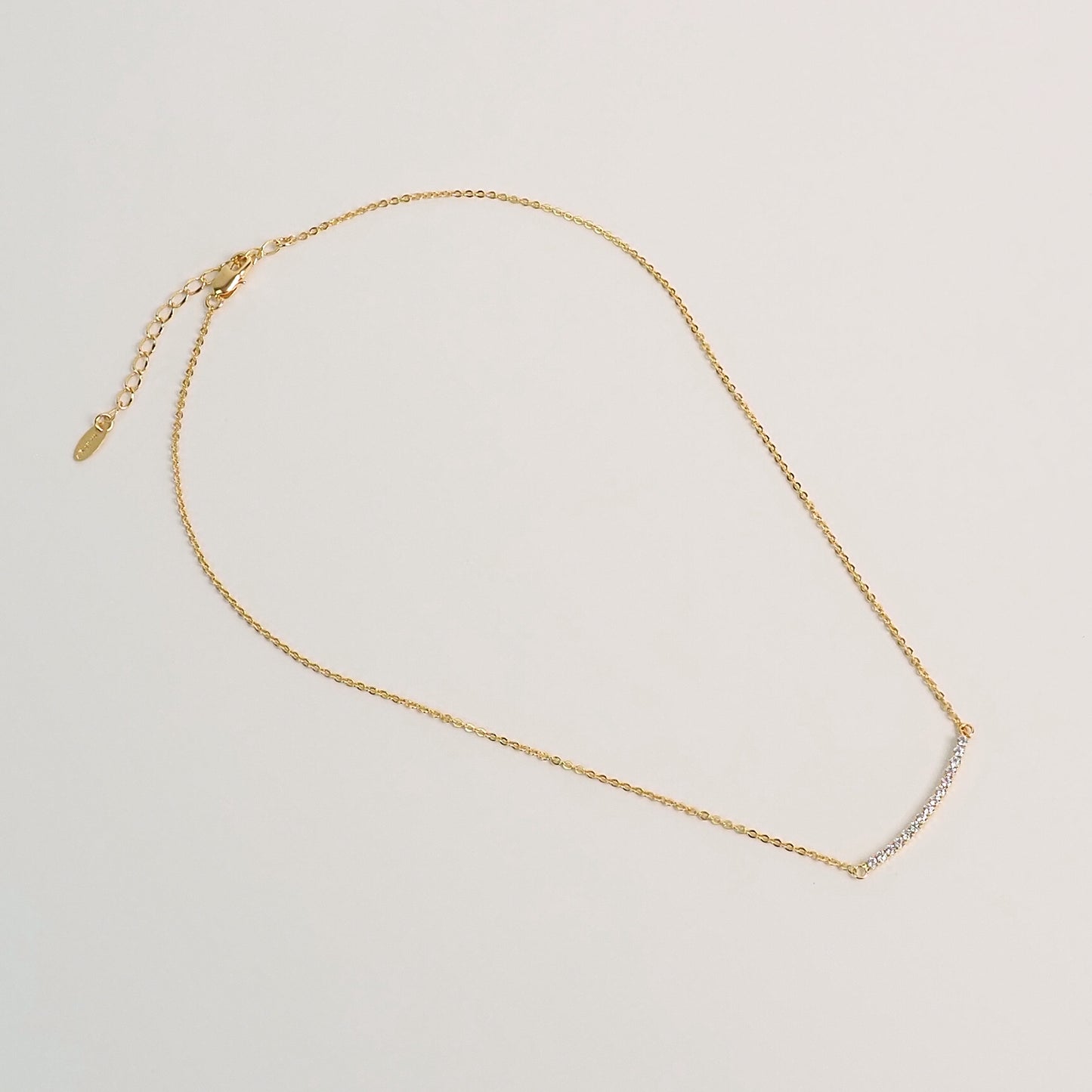 Colar arco zirconia dourado