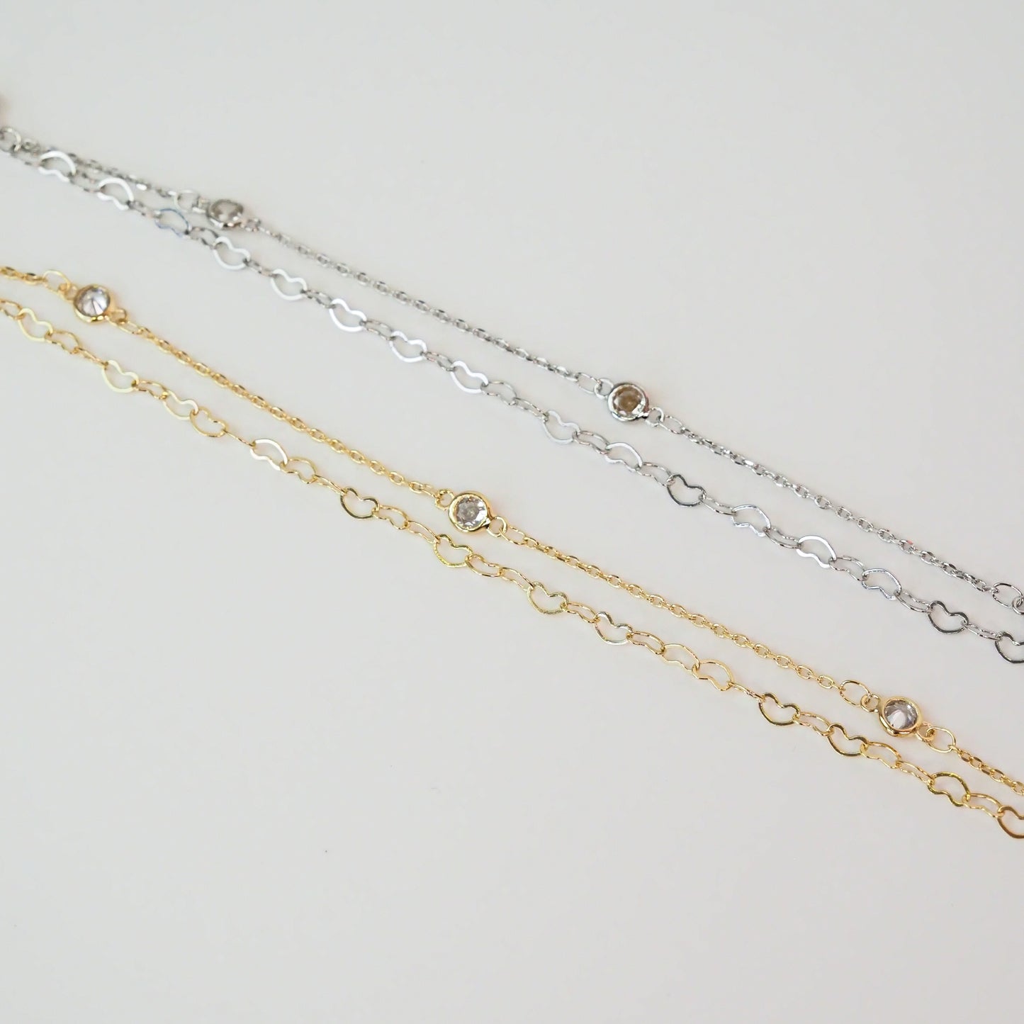 Pulseira dupla corações prateada