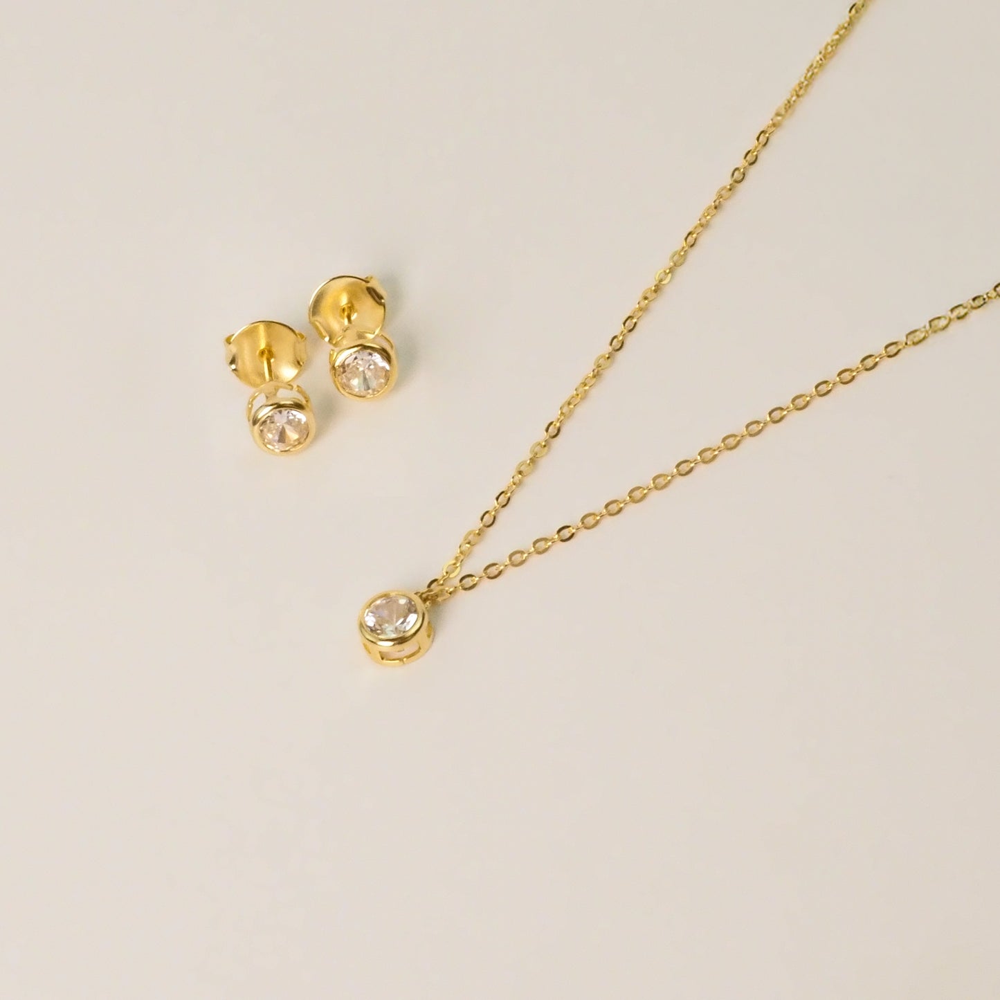 Brinco ponto de luz G Dourado