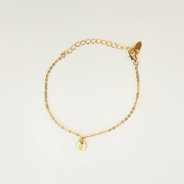 Pulseira medalha inicial dourada