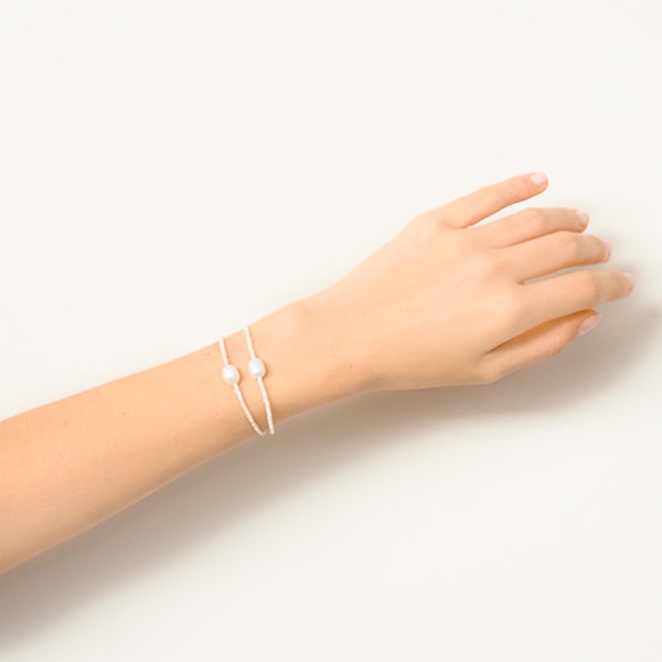 Pulseira aya rosa lilás
