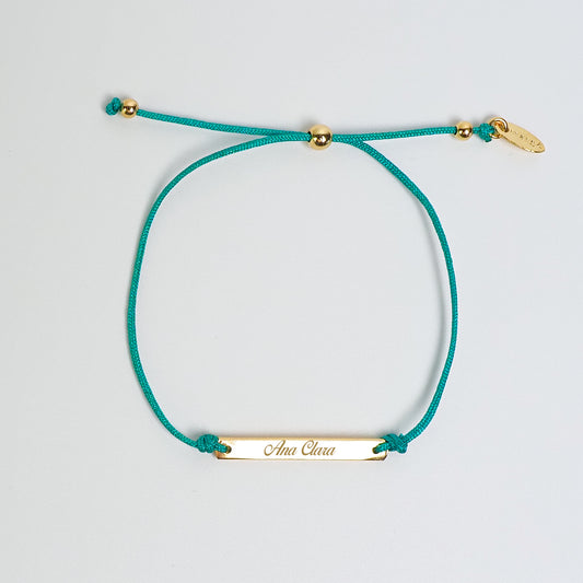 Pulseira inicial plaquinha turquesa dourada - margê atelier