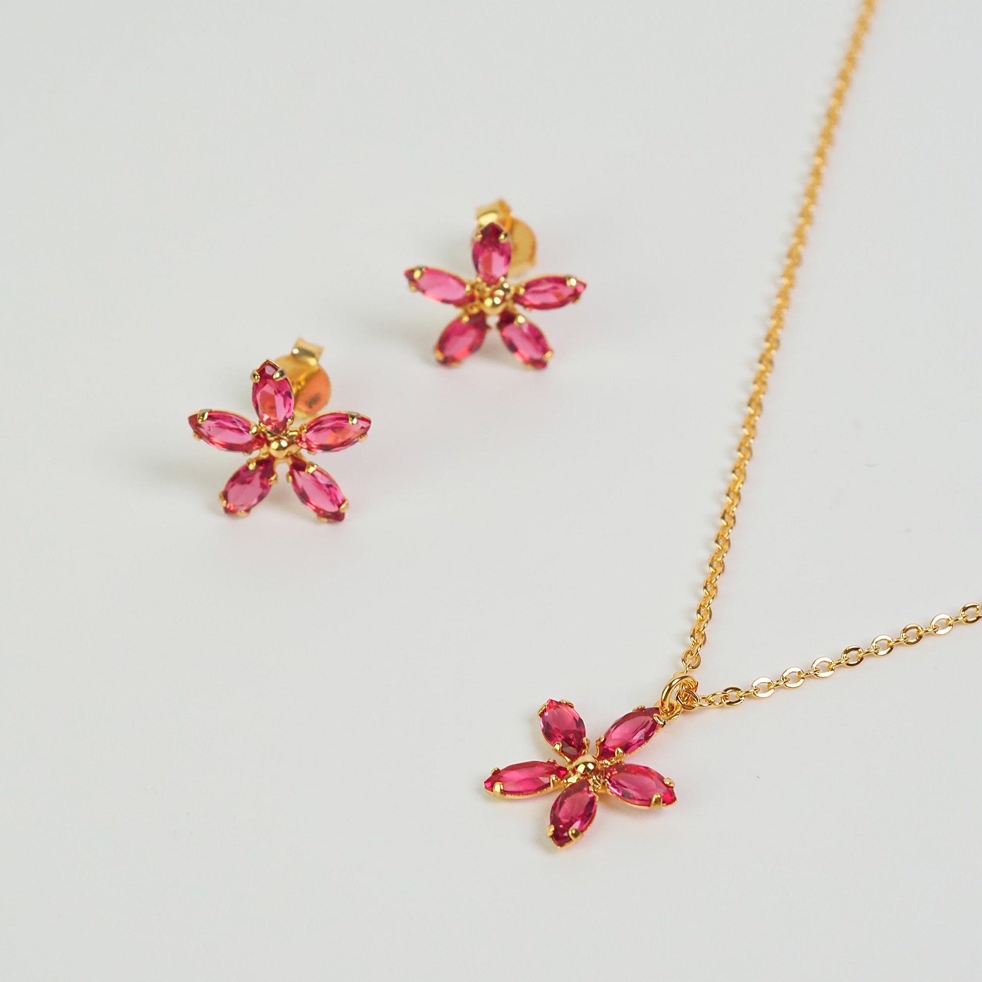 Brinco pétala rosa dourado - margê atelier