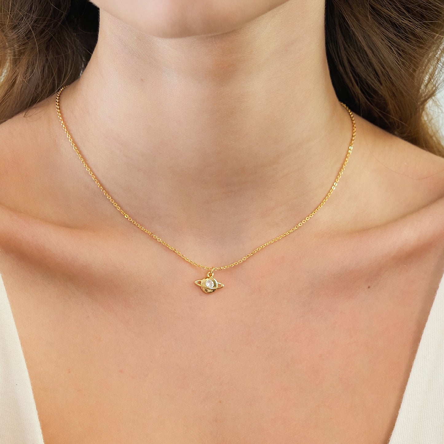 Colar planeta dourado