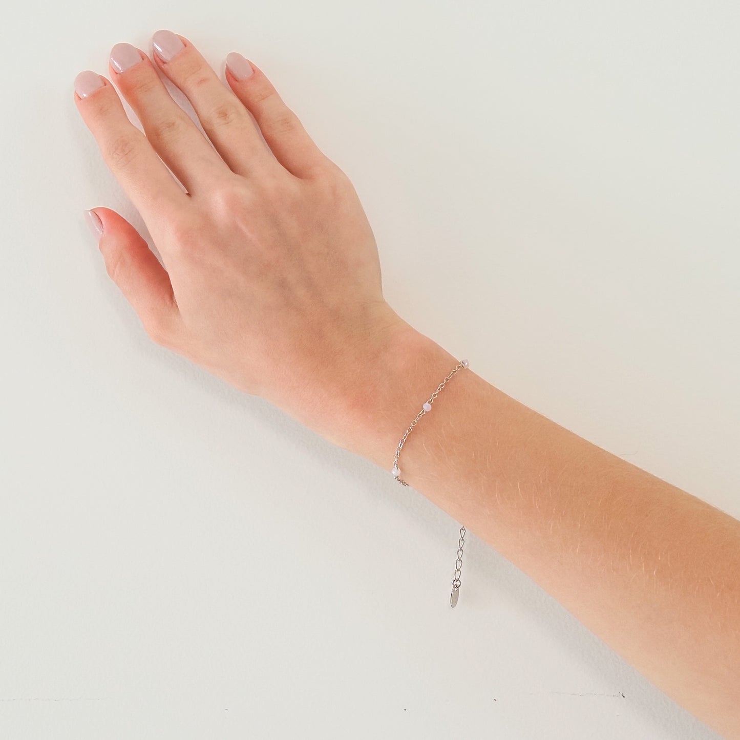 Pulseira pedrinhas rosa prateado