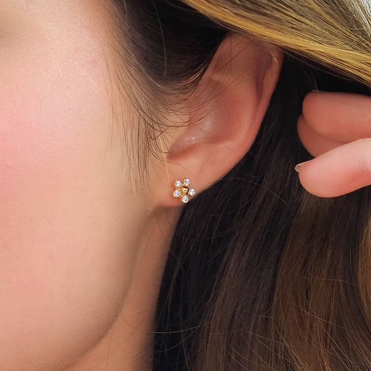 Brinco flor zirconia dourado