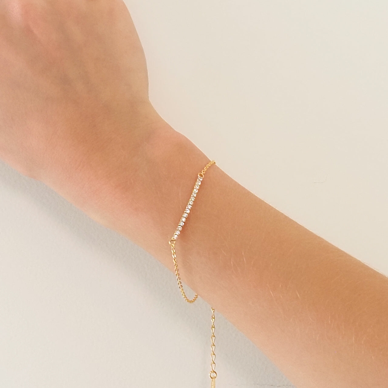 Pulseira arco zirconia dourado