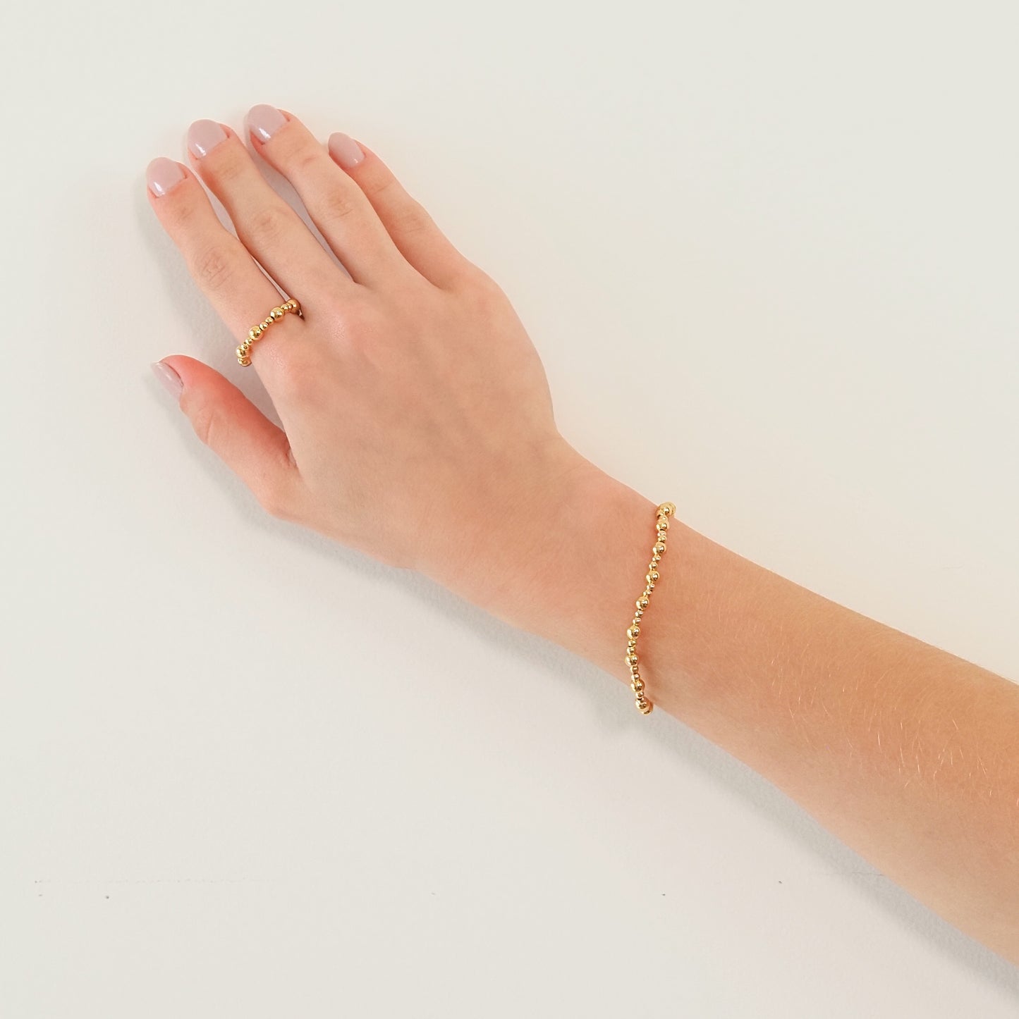 Pulseira confete dourada