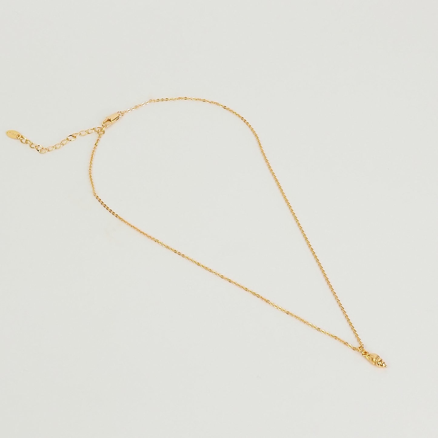 Colar concha dourado