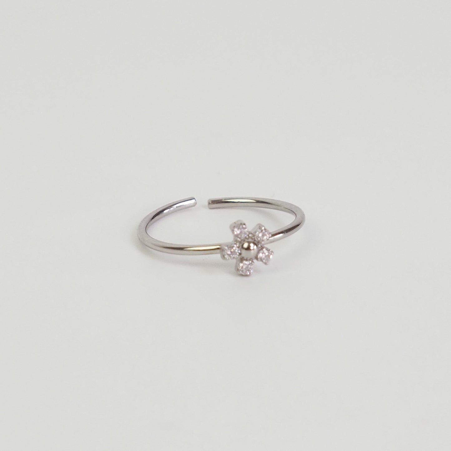 Anel flor zirconia prateada