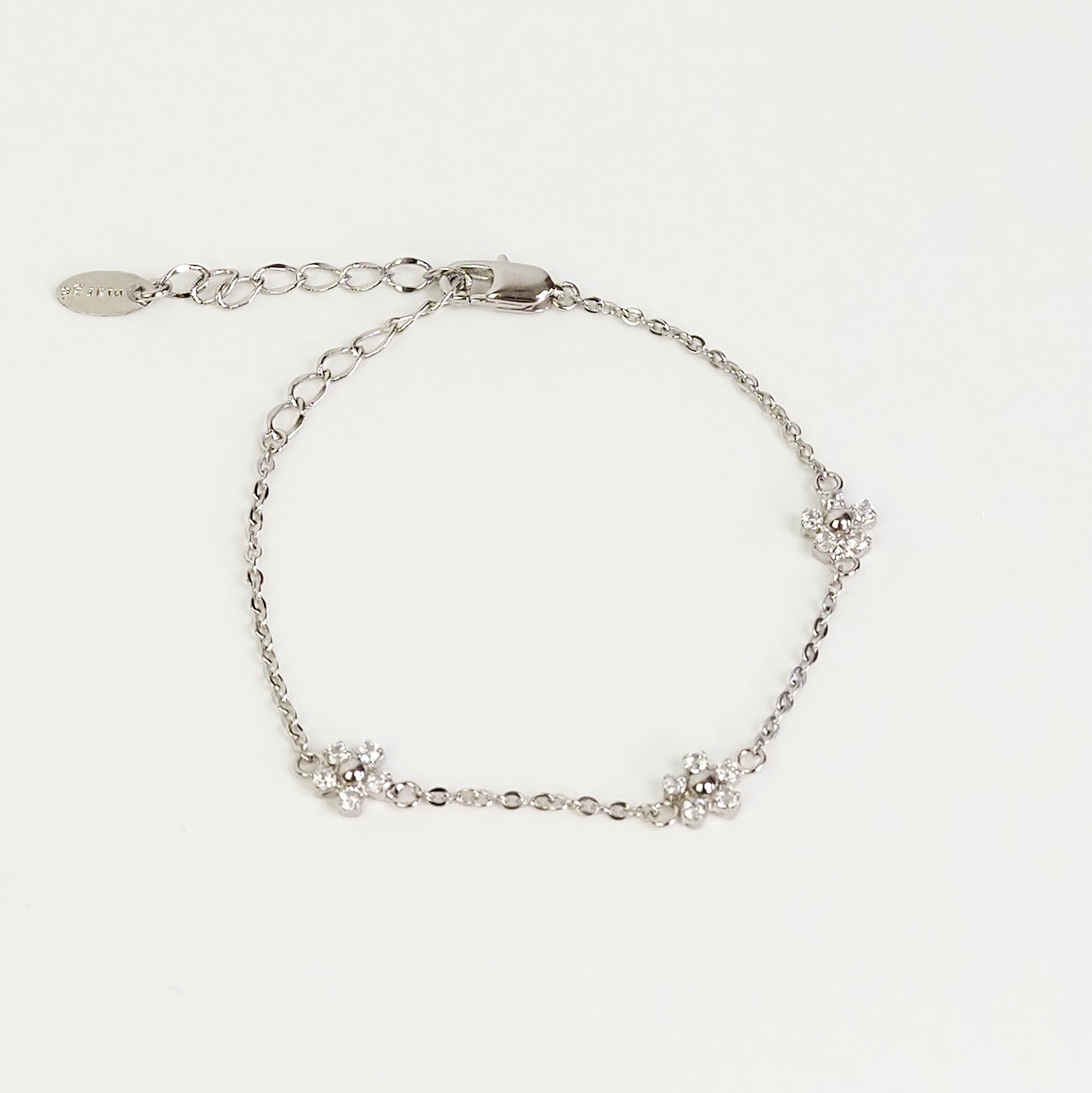 Pulseira flor zirconia prateada