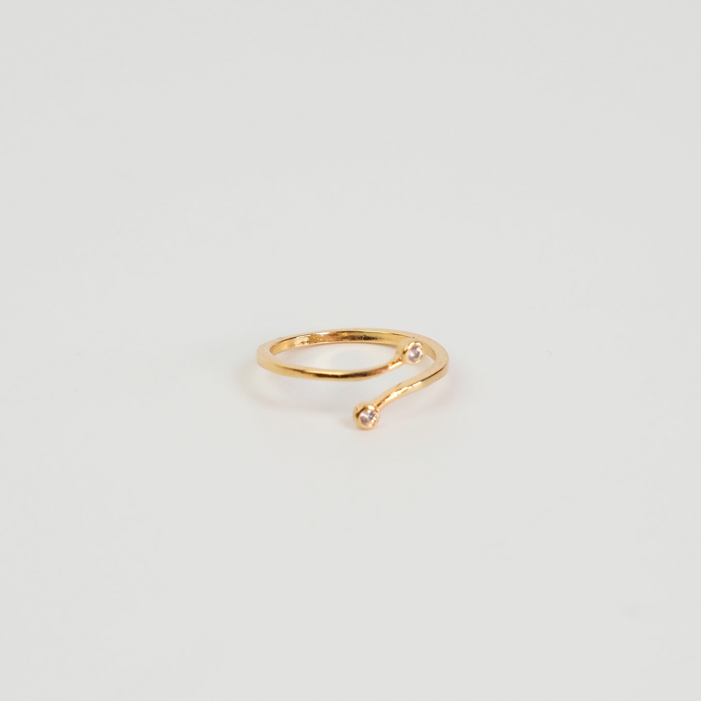 Anel duas zirconias ajustável dourado