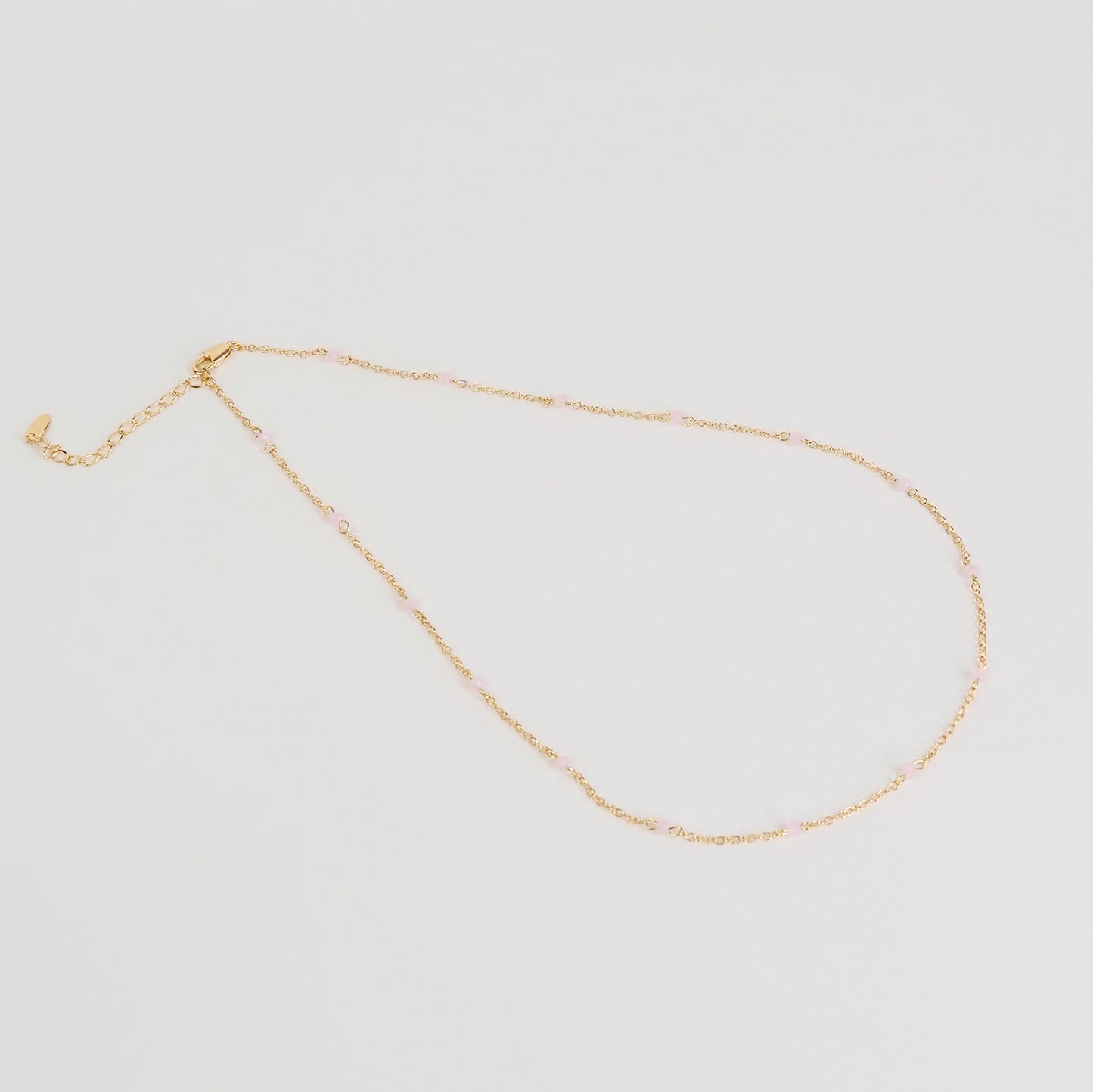 Colar pedrinhas rosa dourado