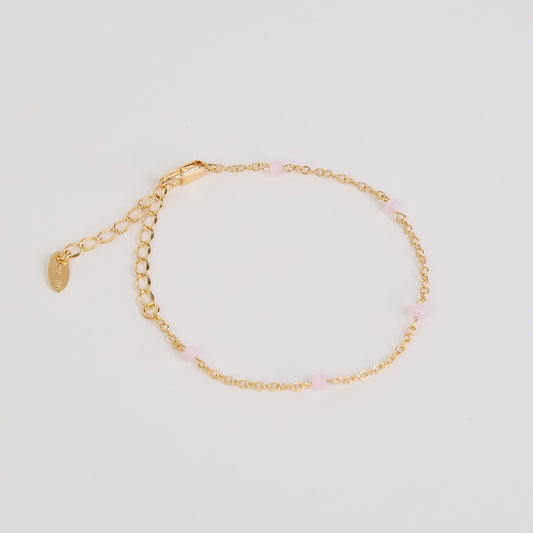 Pulseira pedrinhas rosa dourado