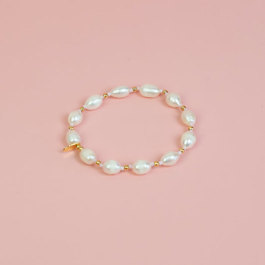 Pulseira pérola lilás dourada
