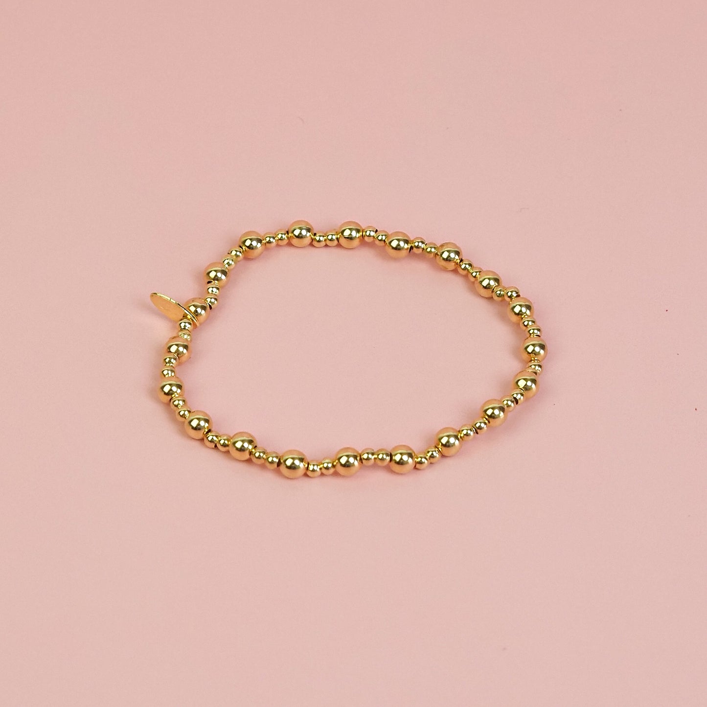 Pulseira confete dourada