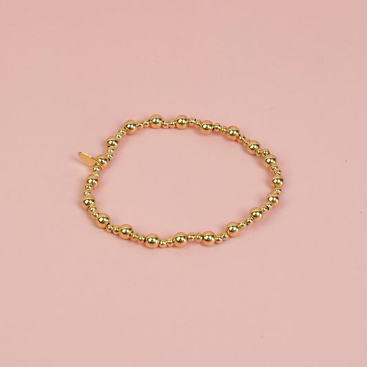 Pulseira confete dourada
