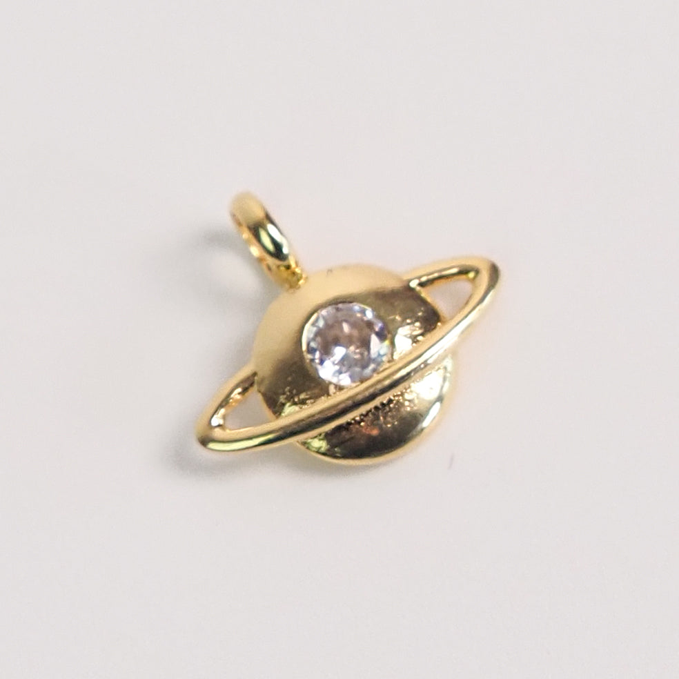 Charm planeta dourado