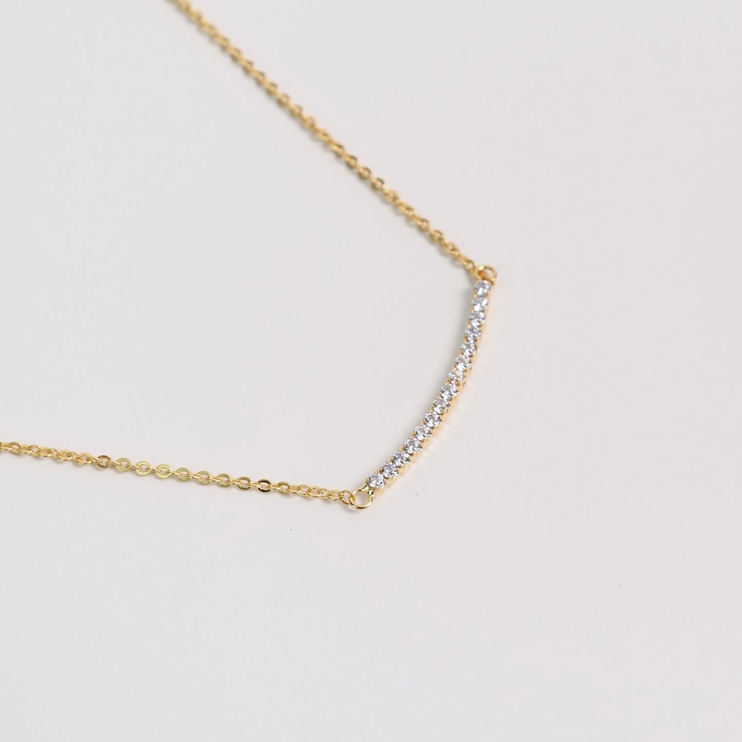 Colar arco zirconia dourado