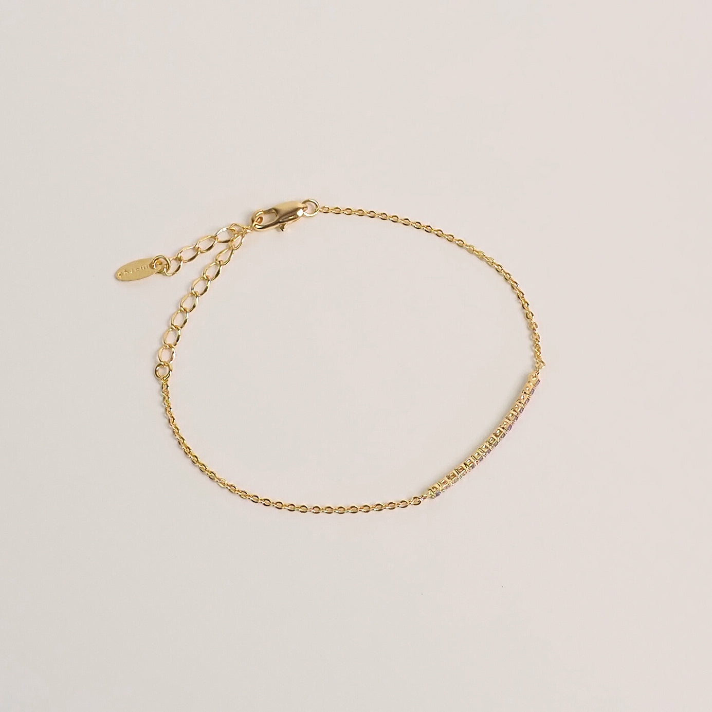 Pulseira arco zirconia dourado