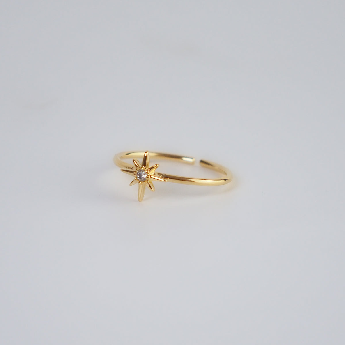 Anel estrela dourado