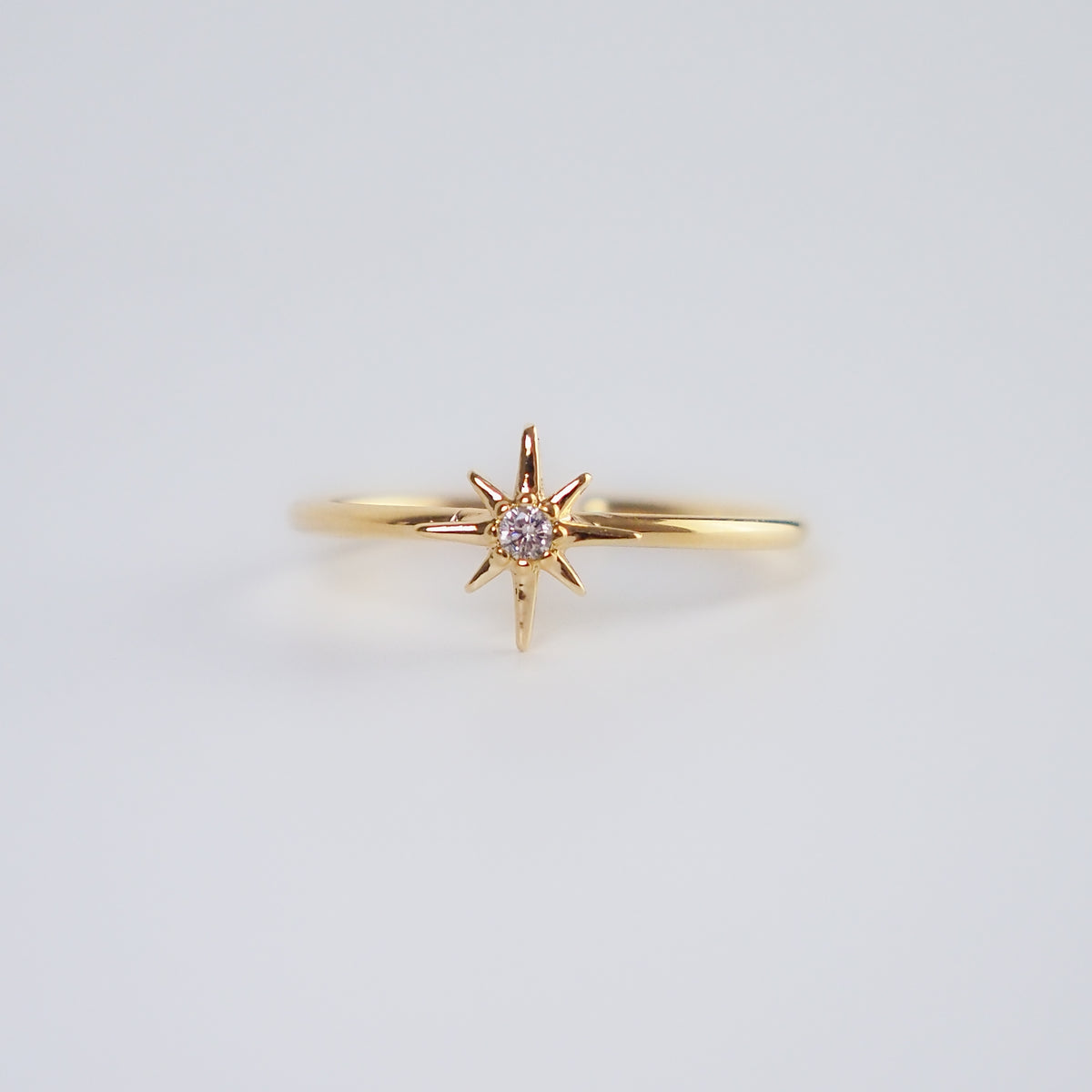 Anel estrela dourado