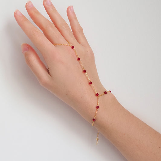Handchain pedrinhas vermelhas dourado