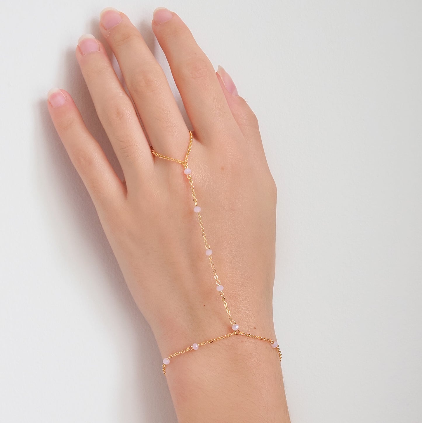 Handchain pedrinhas rosa dourado