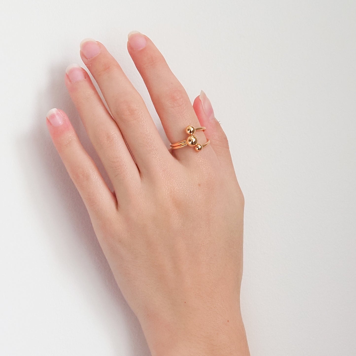 Anel três bolinhas ajustável dourado