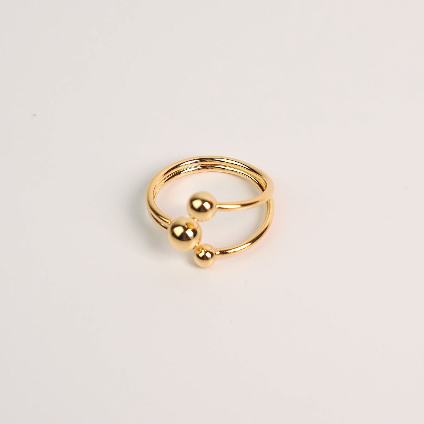 Anel três bolinhas ajustável dourado