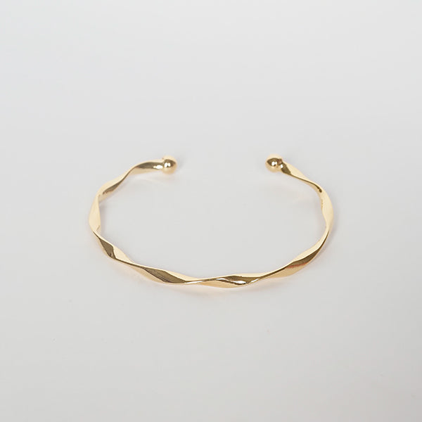 Bracelete torcido dourado