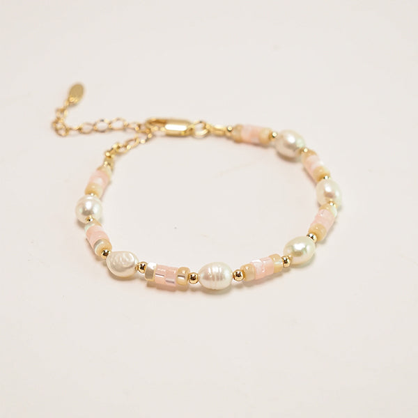 Pulseira discos rosa pastel