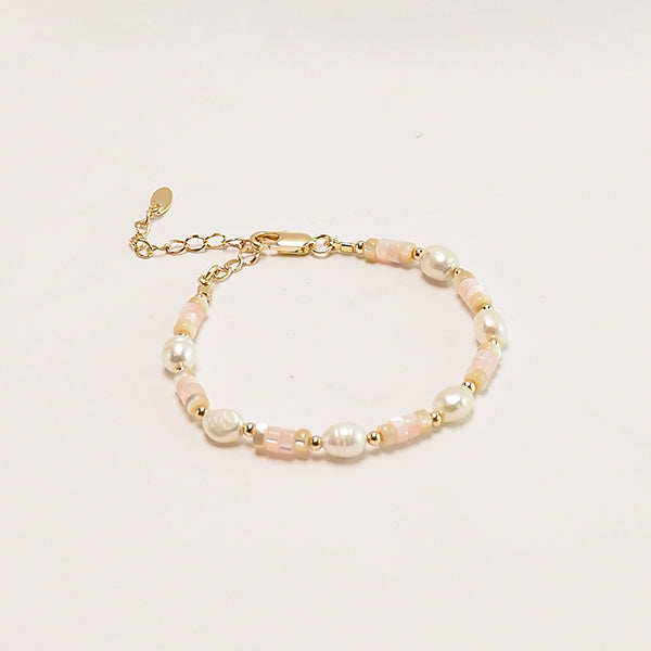 Pulseira discos rosa pastel