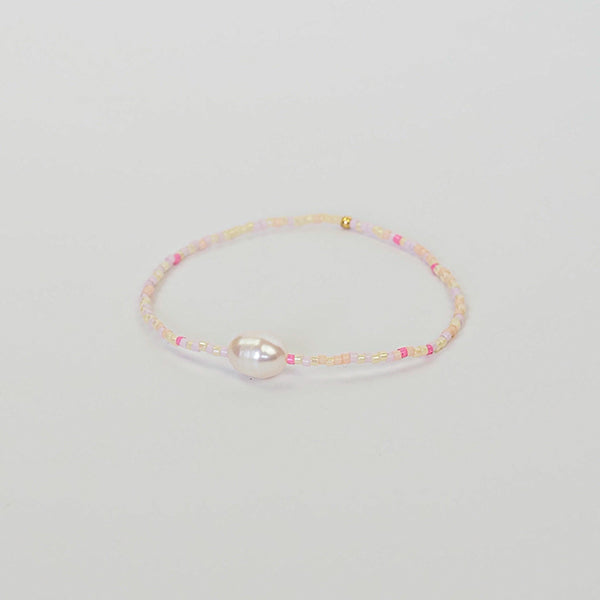 Pulseira aya rosa lilás