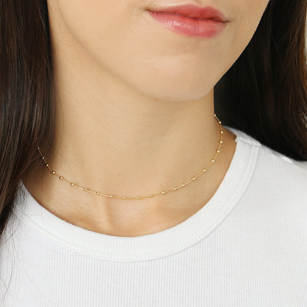 Choker bolinhas dourado