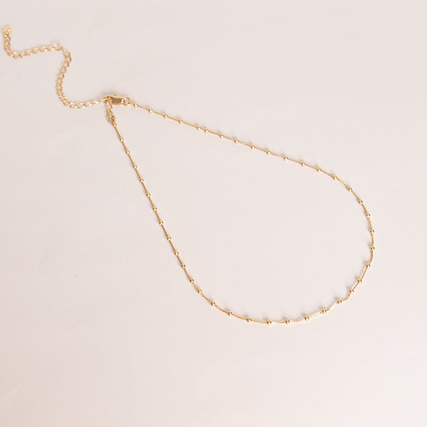 Choker bolinhas dourado